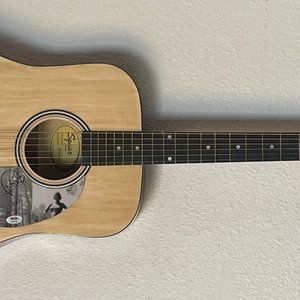 Taylor Swift signed acoustic guitar. PSA authenticated.